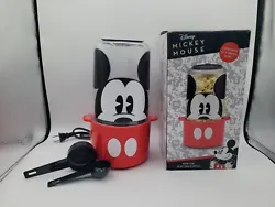 Get ready to add a touch of Disney magic to your movie nights with this red Mickey Mouse popcorn popper! The removable...