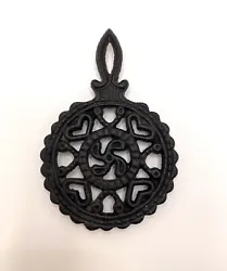 This vintage mini trivet by Tulip is a beautiful addition to any kitchen. The round cast iron design features an...