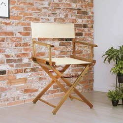 Discover a variety of uses for this classic-style Directors Chair. Constructed with 100% solid wood, this portable...