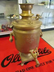 Russian cyrillic writing on top of lid and front of samovar. Good cover and spigot with good body also. Fusick...