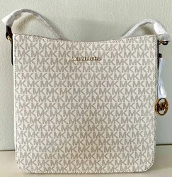 Large zip pocket. Back open pocket. Top ZIP closure. Adjustable crossbody 22