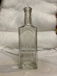 This is a 6 1/2” tall medicine bottle from: Optimus / Stewart & Holmes / Drug Co. / Seattle, Wash. It is in good...