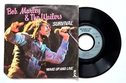 Bob Marley & The Wailers. A1 - Survival (4:00). B1 - Wake Up And Live (5:10). Disque : VG+ (Very Good+) => Très Bon...