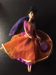 Vintage 1995 Disney Hunchback of Notre Dame Gypsy Dancing Esmeralda DollGood condition except the skirt sheds glitter.