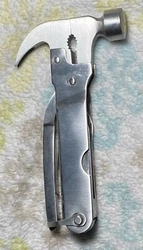 A really nice stainless steel multi tool with 11 tools. Included is a well made canvas carrying pouch with belt loop.