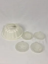 Tupperware Jello Mold 4 Lids. Condition is Used. Shipped with USPS Ground Advantage.