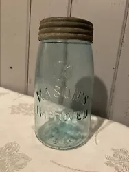 This antique MASON’S IMPROVED glass jar is a beautiful piece of history. The blue/green color and unique design make...