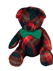 This Vintage Russ Christmas Bear is a charming addition to any holiday decor. The bear features a red and green plaid...