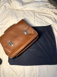 PRADA of MILANO Brown Vitello Leather Briefcase. This briefcase is absolutely stunning! I honestly doubt it was ever...