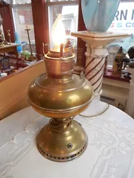 Antique Brass B&H Oil Lamp Electrified. Some dents see all photos. Measures 12