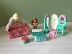 Seven pieces in all:Loving Family Kids Bedroom Set Daybed, Chair, 3 Sided Mirror, Ottoman & More.The little girl is...