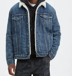 Style # 163650089. The classic Levis® Trucker Jacket is made cold-weather-proof with warm sherpa insulation and a soft...