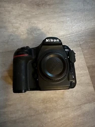 2 Nikon Lithium Ion Batteries - EN-EL15a. NIKKOR AF 50mm 1:1.8D with lens cap & lens hood.
