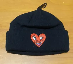 Keith Haring Black Rolled Knit Beanie Embroidered Laughing Heart NWOT $35Short roll ribbed knit beanie topped with...