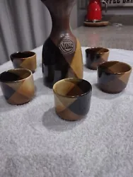 Vintage Vino Pottery Craft Wine Set Carafe & 6 Cups Made in USA Boho Colorway. Please notice that there are 2 cups that...