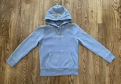 Hollister hooded sweatshirt. Color: blue. Washed in cold water and hung to dry to avoid fading and shrinkage.