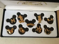 Vintage - Like New - Exclusive Disney Store 9 Pin Collection - featuring Mickey and Minnie Mouse,  Mickey Glove,...