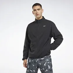 Meet the wind head-on in this mens Reebok running jacket. Speedwick fabric and a durable water-repellent finish help...