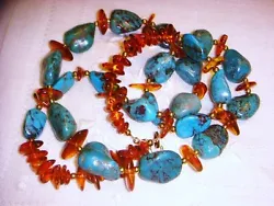Up for sale, I have a very beautifully made natural Baltic Amber and natural turquoise necklace. The necklace is 28