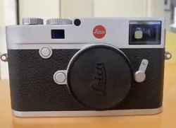 Leica M 10 digital rangefinder camera body, silver. Used but in mint condition. Additional items Included: original...