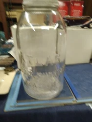 Add a vintage touch to your home with this beautiful Hazel Atlas Strong Shoulder Mason half gallon jar. The clear color...