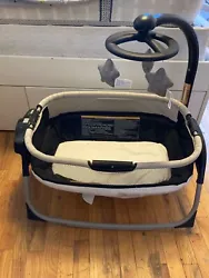 mini bassinet with ladybug seat and body board included. Used this for my babies first few nights home. Trying to get...
