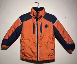 Made of 100% polyester, this parka style jacket features a zip closure and a solid orange color. It is designed to be...