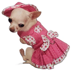 Strawberry Patch Dress Set-4 Piece Set. It has a unique jumper style. It is made with a candy pink polka dot fabric....