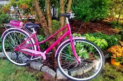 This pink hybrid bike by Schwinn, model Carrington, is perfect for women or girls who are 51 and up. It features a step...