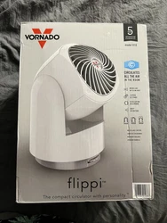 Introducing the Vornado Flippi V10 Compact White Oscillating Vortex Airflow Air Circulator Fan - the perfect addition...