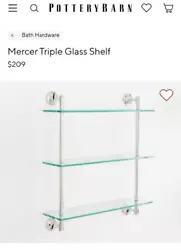 Three tempered-glass shelves provide accessible storage for toiletries, towels and skincare.