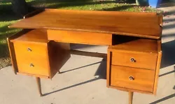 This Mainline mid-century modern desk is a stunning piece of furniture that will add character to any workspace or...