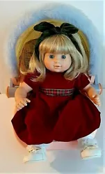 This Blonde Bitty Twin Girl is Cute as a button with her Red Velvet Dress with Olive & Red Plaid ribbon pattern at her...