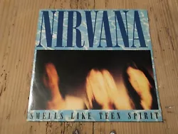 45 tours Nirvana  Smells Like Teen Spirit / Even in his youth (NM/NM) 1991.  Pas de trouble de lecture. Excellente...