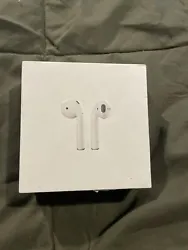 Apple AirPods with Charging Case - White. Condition is New. Shipped with USPS Ground Advantage.