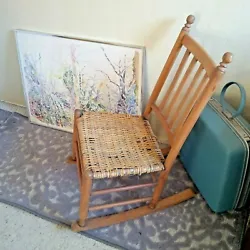 Antique woven seat solid wood spindle back childs rocking chair, Shaker style, good condition for age. Overall good...
