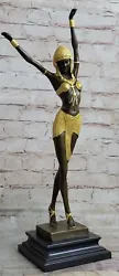 Presenting an exquisite bronze statue that captures the grace, agility, and flexibility of a vibrant dancer. The statue...