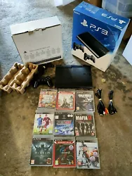 Sony PlayStation 3 Ultra Slim 12 Go Pack de Console Avec 9 Jeux.  Console en bon état testée et fonctionnelle Vendue...