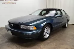 HIGHLIGHTS: Wow! Beautifully maintained, almost all original 1996 Impala SS!! Dark Green Gray Metallic paint, beautiful...