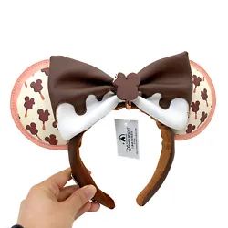 Cloisonné Disney Parks x Loungefly label at side. Mickey Mouse ice cream bar print on ears. Headband features non-slip...