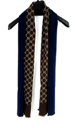 GUCCI Blue & Brown Logo Scarf. Rectangular wool and Wool-blend scarf in Navy Blue on one side and Brown Logo side....