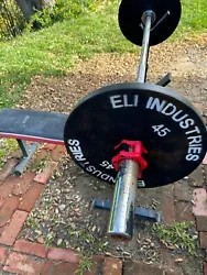 Weight bench with olympic bar and weighs 2 X 45 lbs. and 2 x 5 lbs. local Pick up ONLY.