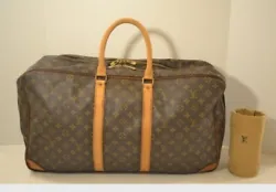 Louis Vuitton LV Travel Bag Sac 48 Heures 58 Browns Monogram Canvas is in beautiful condition. Slight darkening to the...