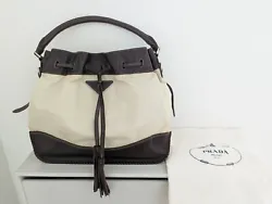 Prada top handle satchel. - Cream nylon + dark brown leather trim. Height 12.25