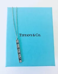 TIFFANY & CO. ATLAS WHITE GOLD BAR PENDANT NECKLACE. Stunning piece from the iconic Tiffany Atlas Collection....