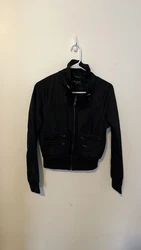 Black Rivet Black Cropped Moto Biker Jacket w/ Zipper Accents + Collar. Excellent condition. Like new. No flaws. Height...