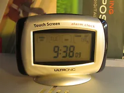 Ultronic Desk Alarm Clock. Touch screen setting. Requires (2) AAA batteries.
