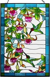This 10 x 15 inch stained glass window hanging featuring a beautiful hummingbird is the perfect addition to any home...