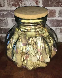 Beautiful large pumpkin shape caulk top teal colored apothecary jar full of corks please refer to photos provided as...
