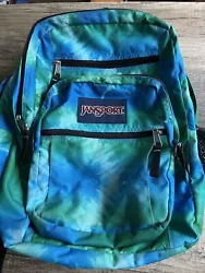 This classic Jansport backpack in a tie dye blue and green design is the perfect accessory for work or school. All...